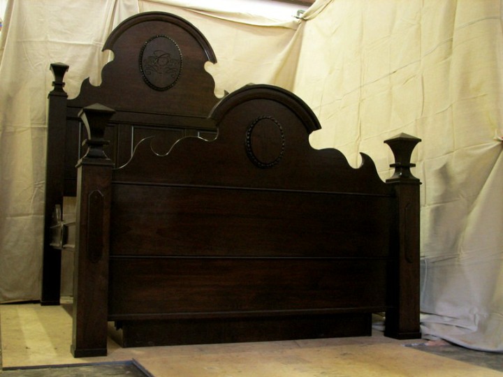 Custom carved walnut bed